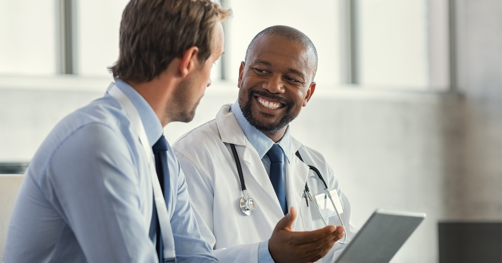 two male doctors talking