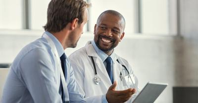 two male doctors talking